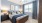 bedroom with ceiling fan and natural light