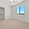 bedroom with carpet and window