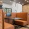a row of booths and tables